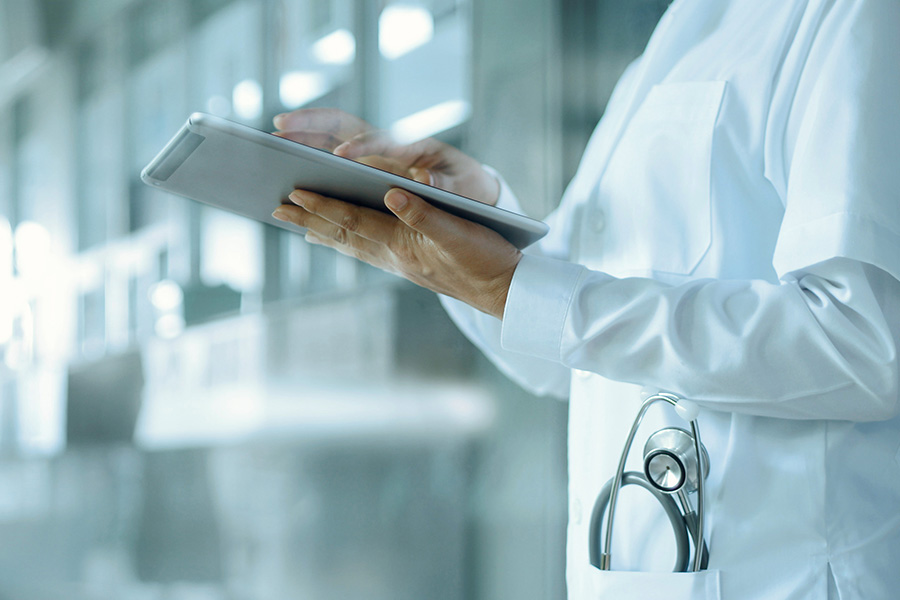 Healthcare staff with a tablet